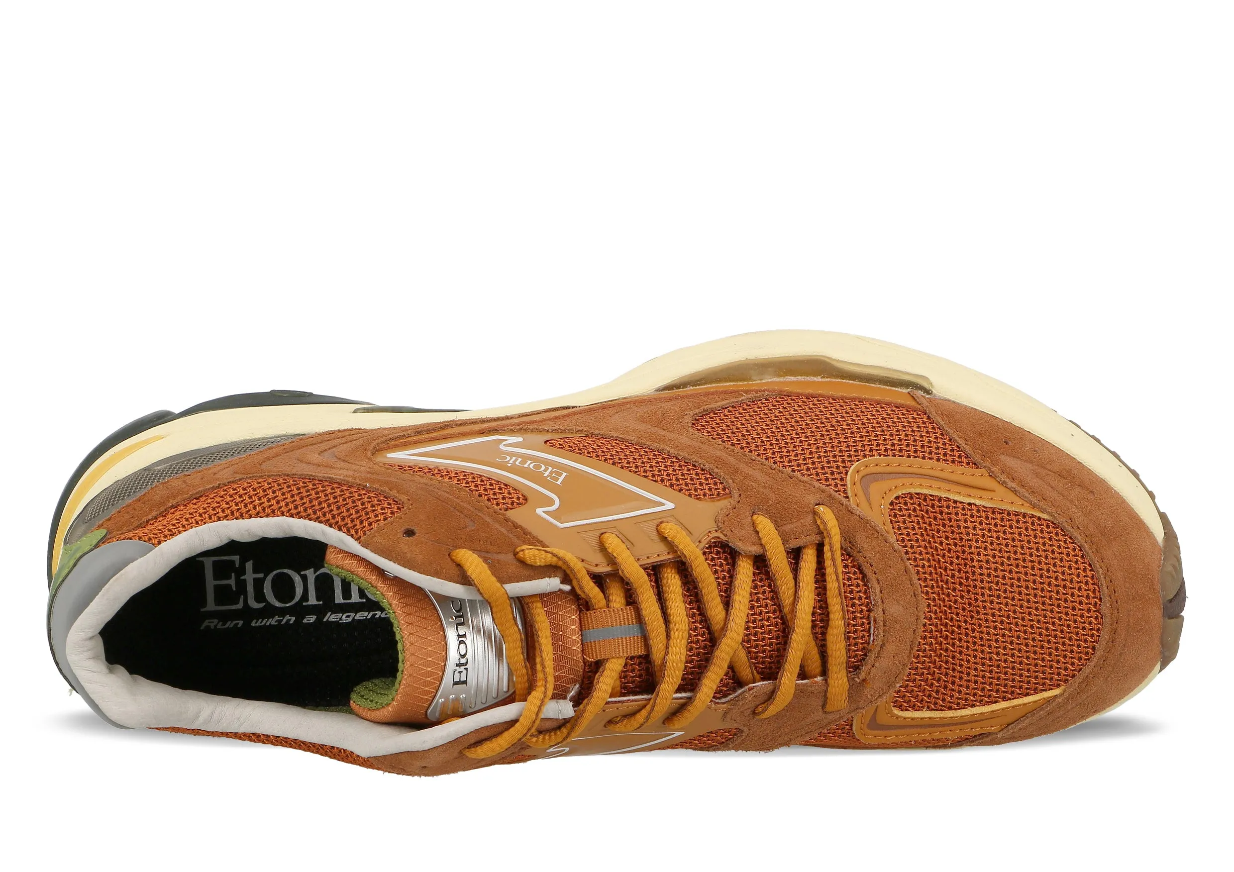 Etonic Evolution sneakers in rust orange mesh fabric and tonal suede leather with orange and aloe green leather inserts.