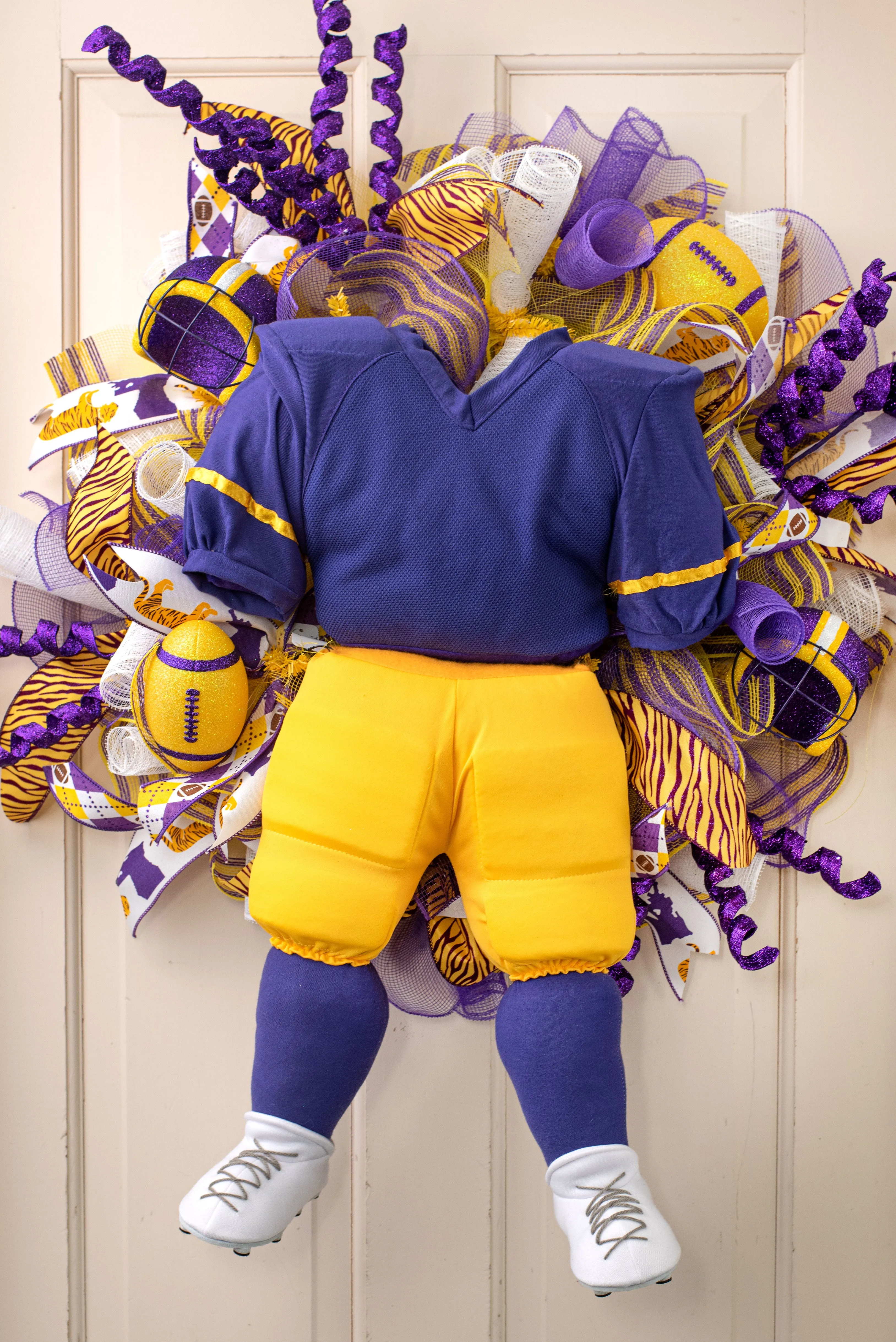 Plush Football Player Wreath Accent: Purple, Yellow, White